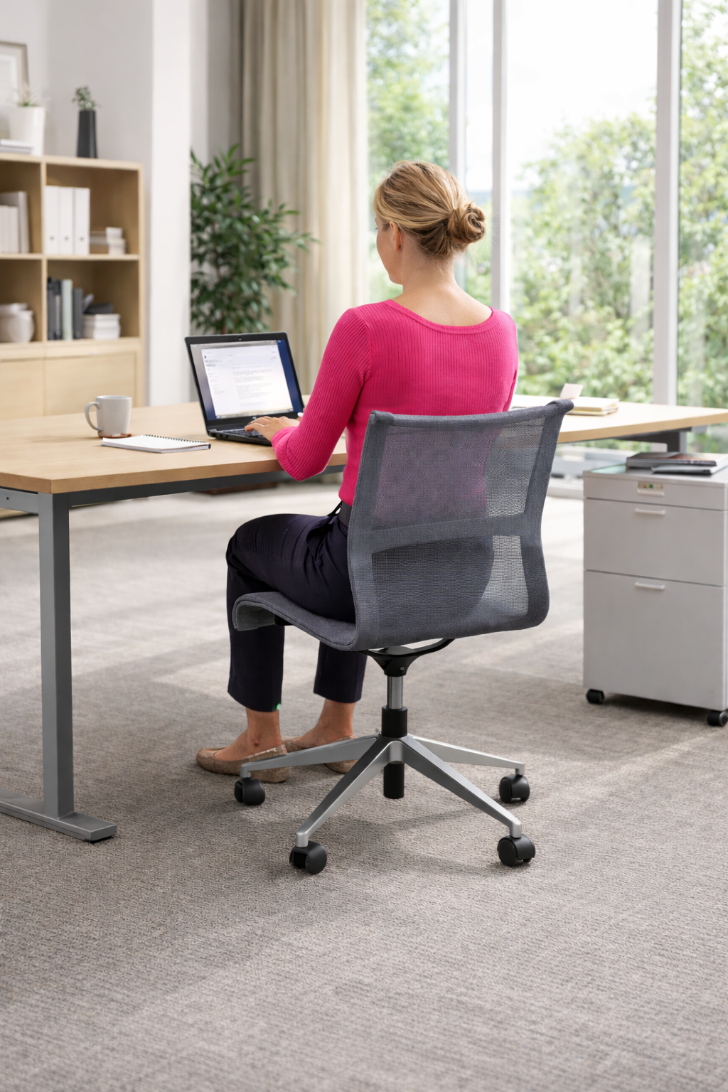 <tc>Herman Miller</tc>: Silla de trabajo gris (sin brazos) - Reacondicionada